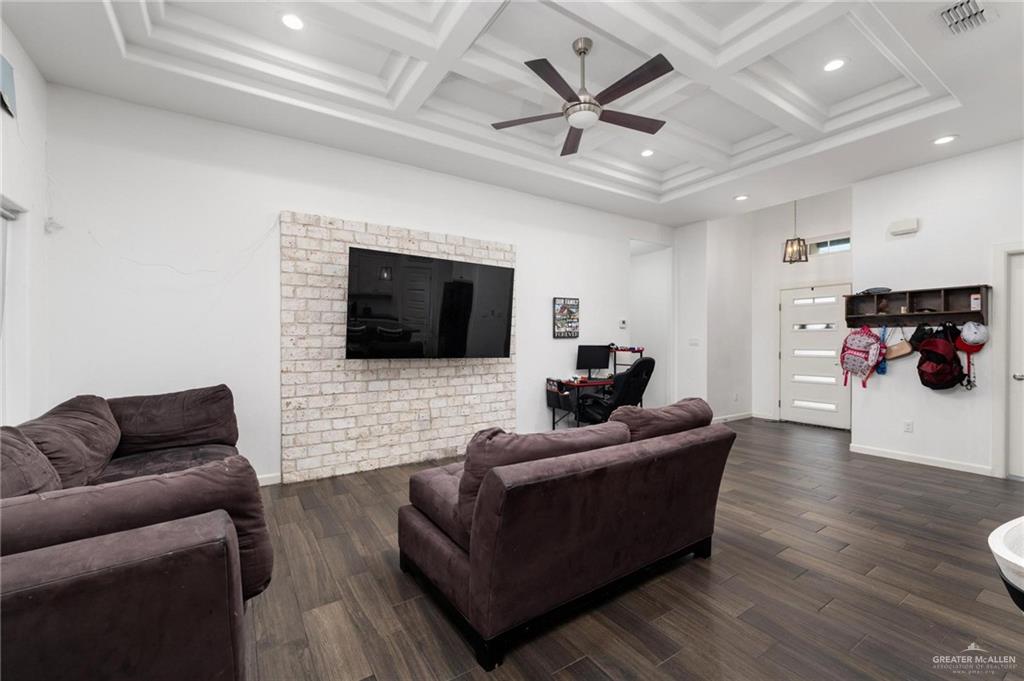 405 Scarlett Red Harlingen, TX 78552 - Photo 15 of 15 a living room with furniture and a flat screen tv