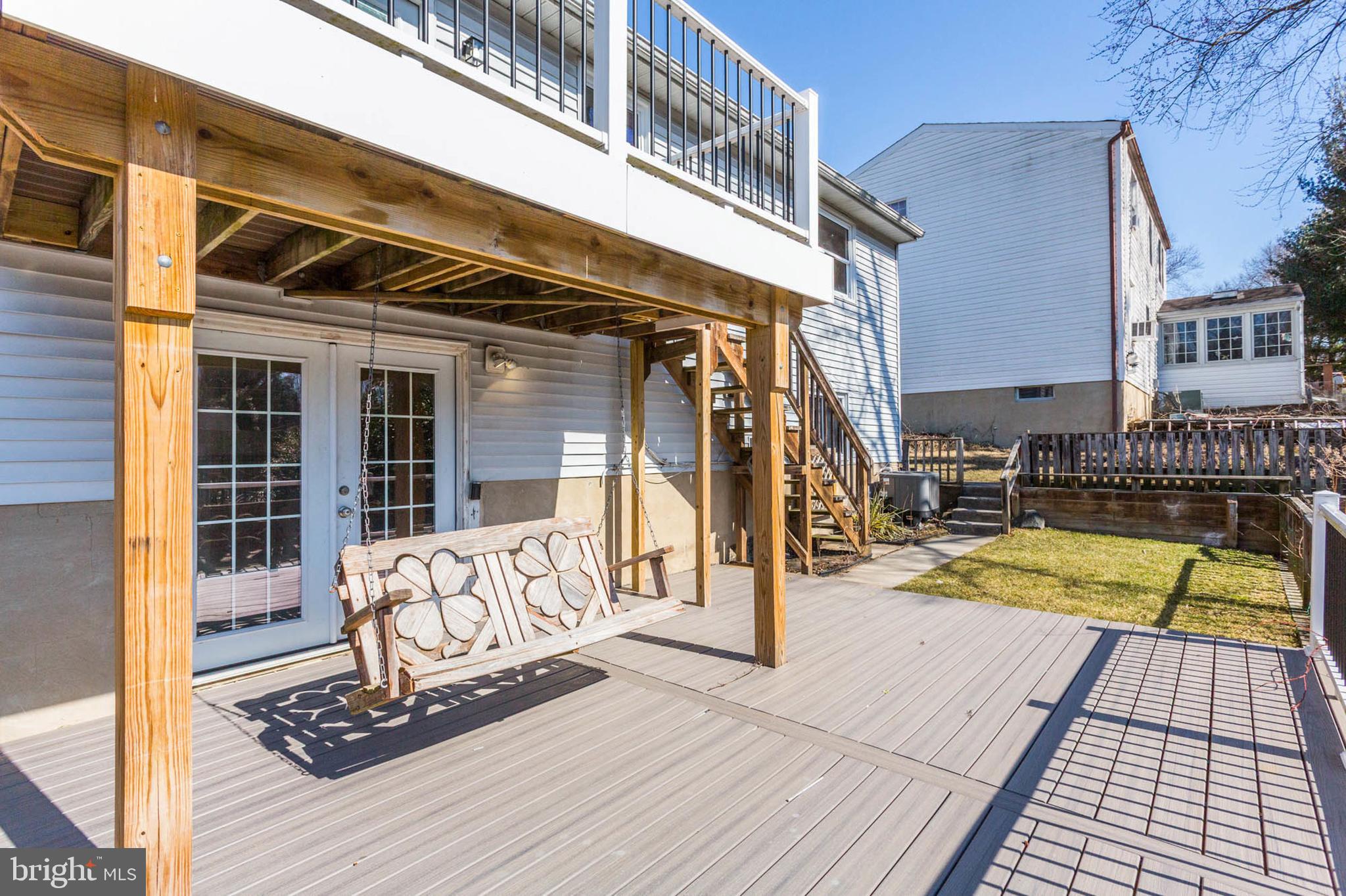3606 Rusty Rim Ellicott City, MD 21043 - Photo 23 of 27 Lower deck w/ charming porch swing