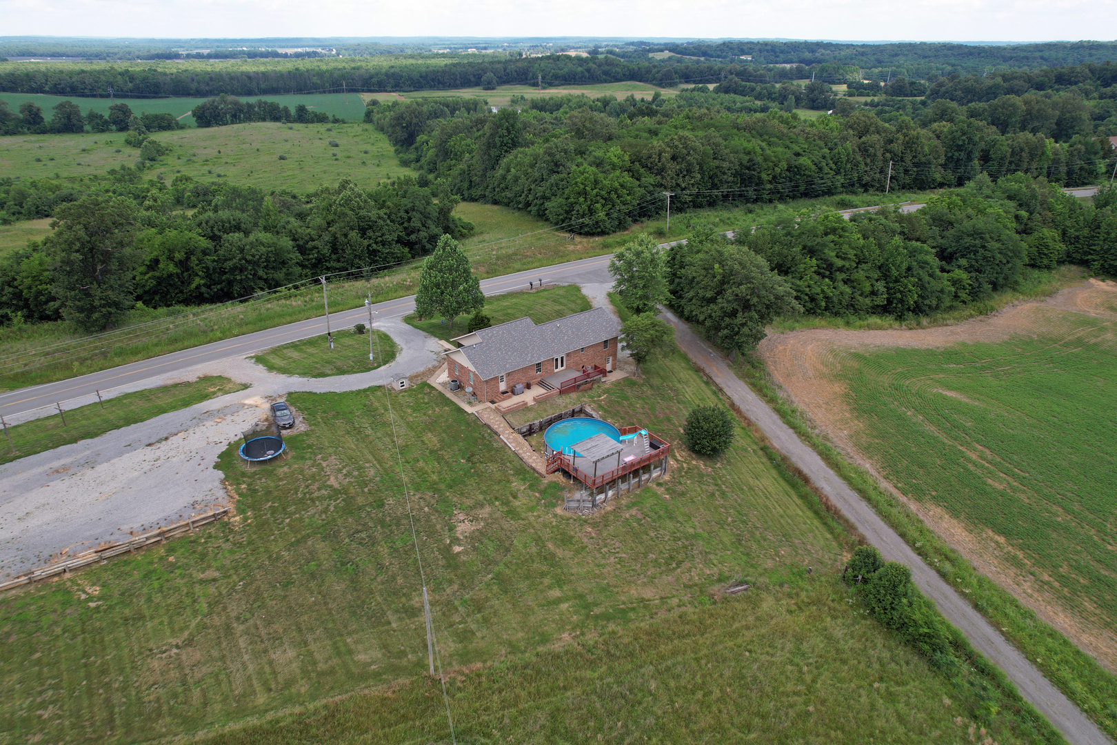 5488 Tick Ridge Road Grand Chain, IL 62941 - Photo 54 of 55 a view of a swimming pool with a yard