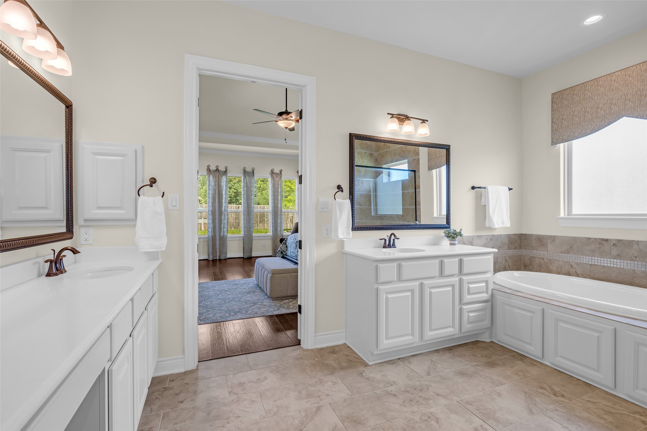 14003 South Evergreen Ridge Court Conroe, TX 77384 - Photo 24 of 43 Separate vanities provide added convenience and personal space for busy mornings.