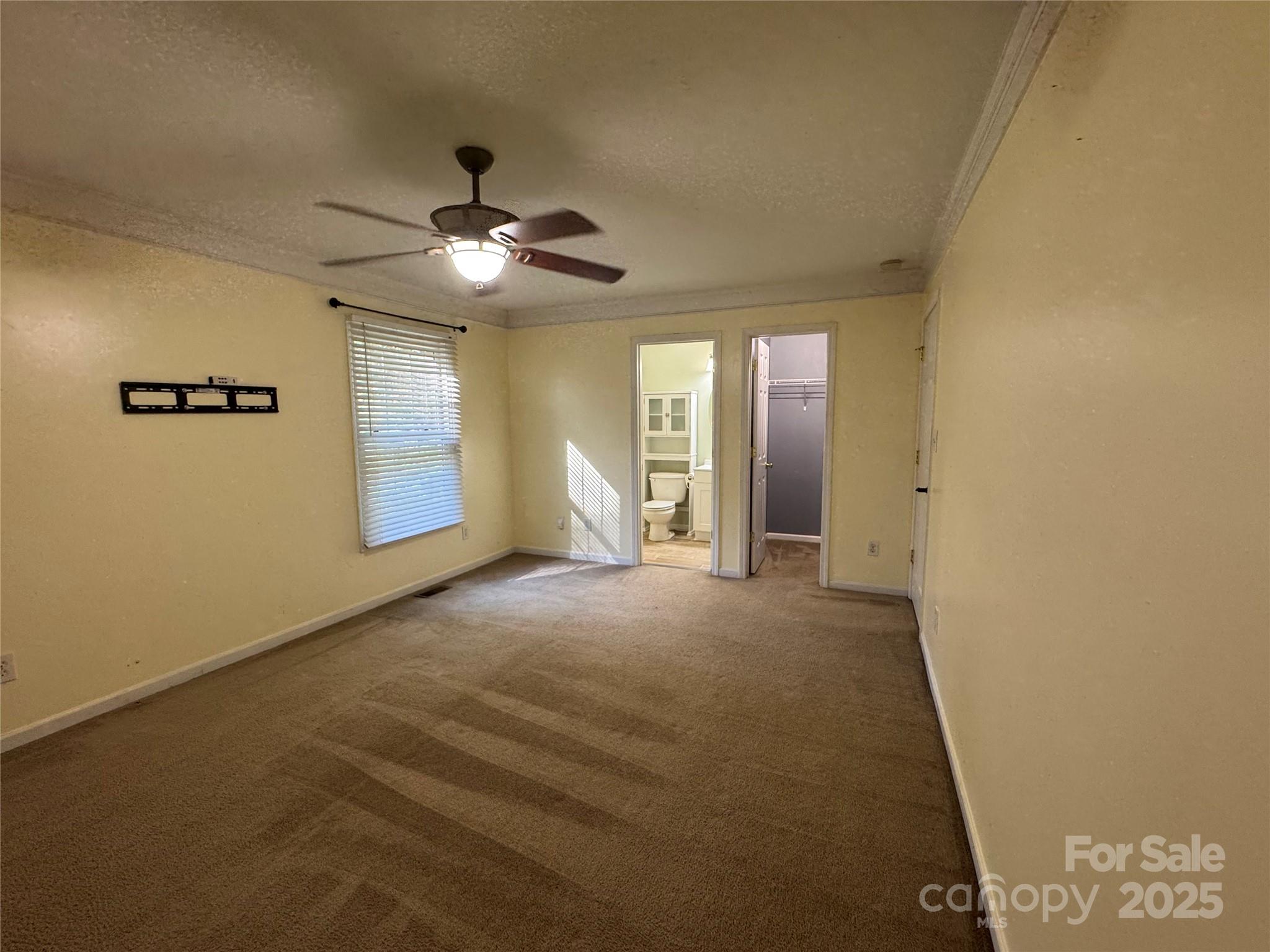 314 East Louisiana Avenue Bessemer City, NC 28016 - Photo 12 of 15 a view of an empty room with a window
