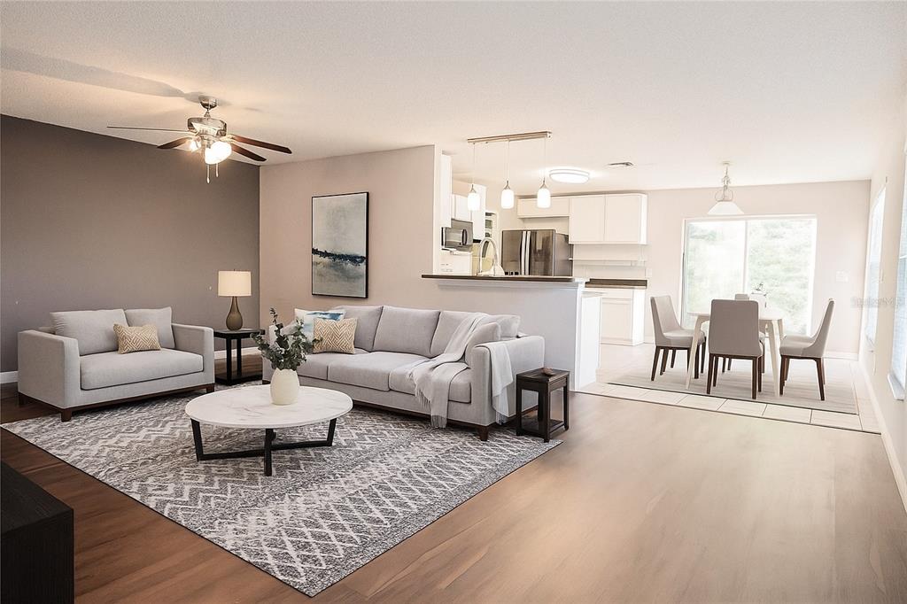 1836 Ridge Valley Street Clermont, FL 34711 - Photo 12 of 45 a living room with furniture and a couch
