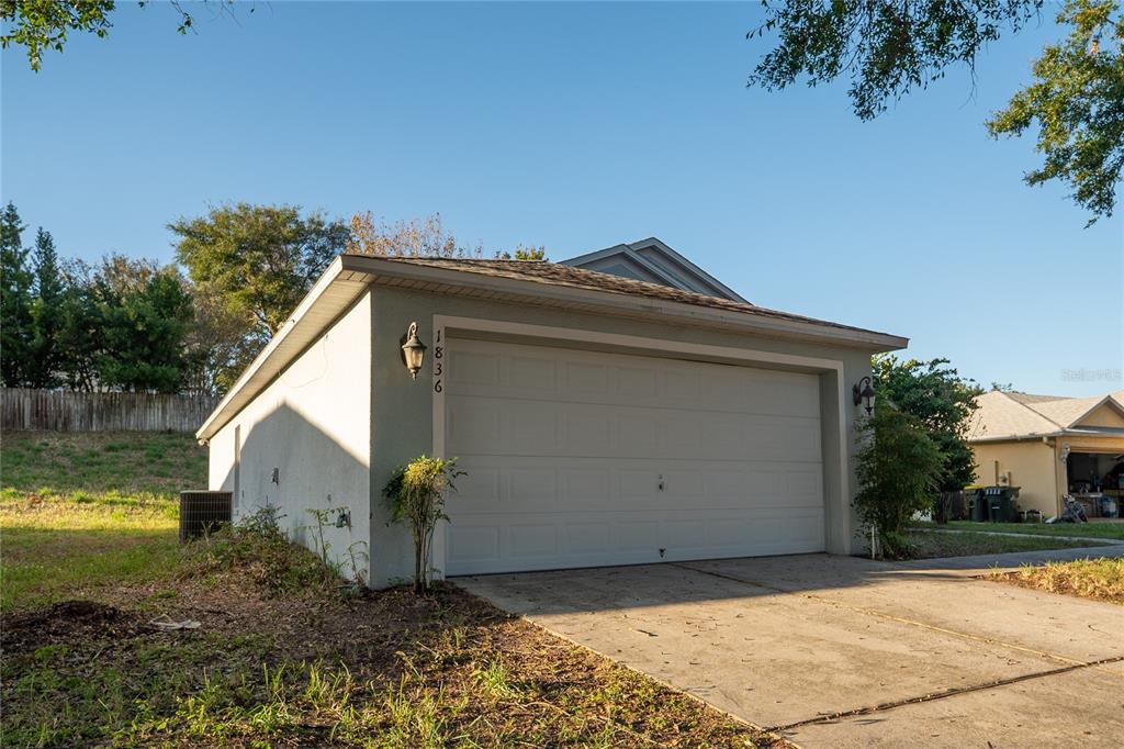 1836 Ridge Valley Street Clermont, FL 34711 - Photo 3 of 45 a view of a house with a yard