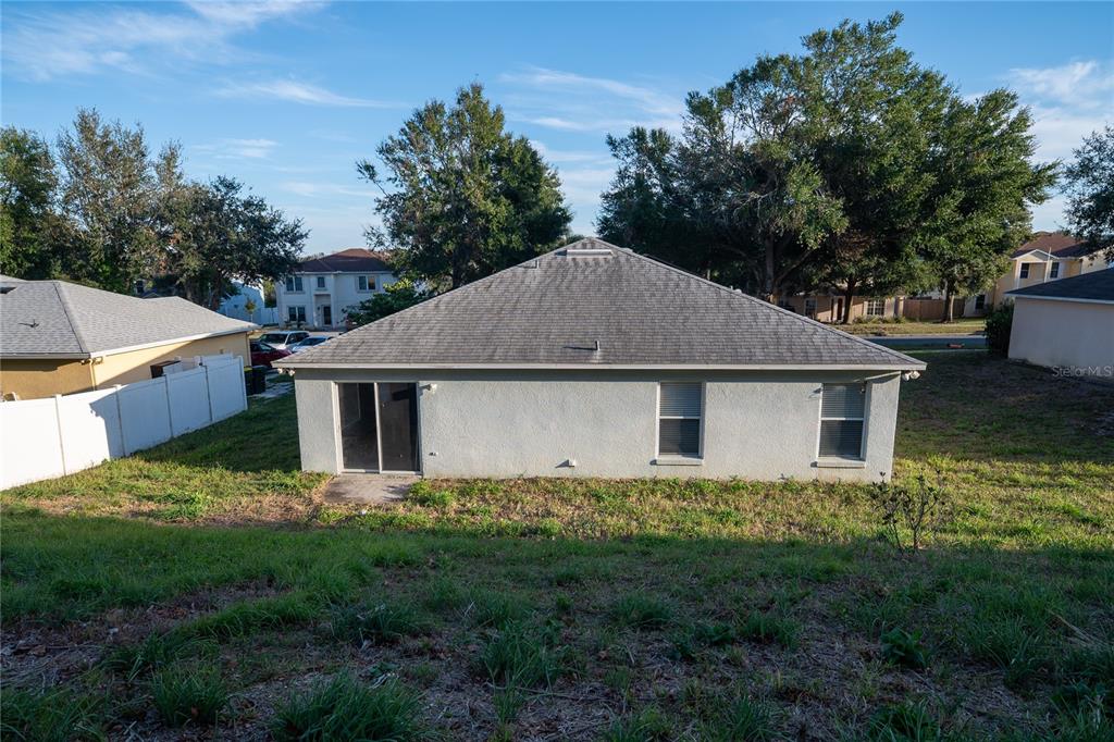 1836 Ridge Valley Street Clermont, FL 34711 - Photo 6 of 45 a front view of house with yard and trees