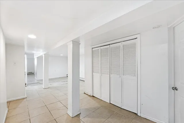 a bathroom with a toilet and shower