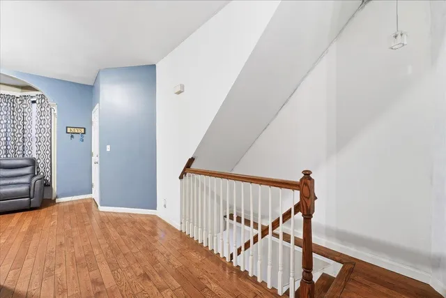 a kitchen with stainless steel appliances granite countertop a refrigerator stove and sink