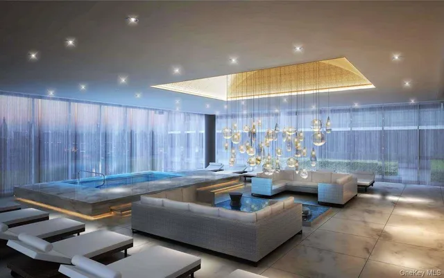 a living room with furniture and a painting