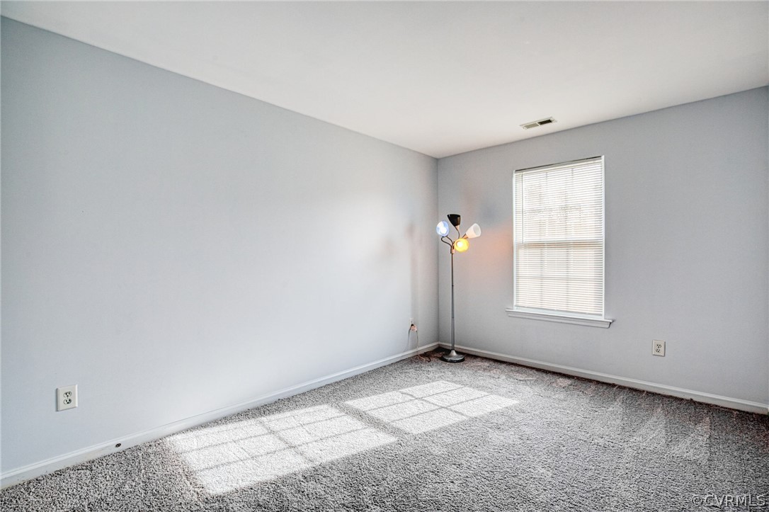 7292 Hardtack Road Mechanicsville, VA 23116 - Photo 21 of 34 an empty room with a window