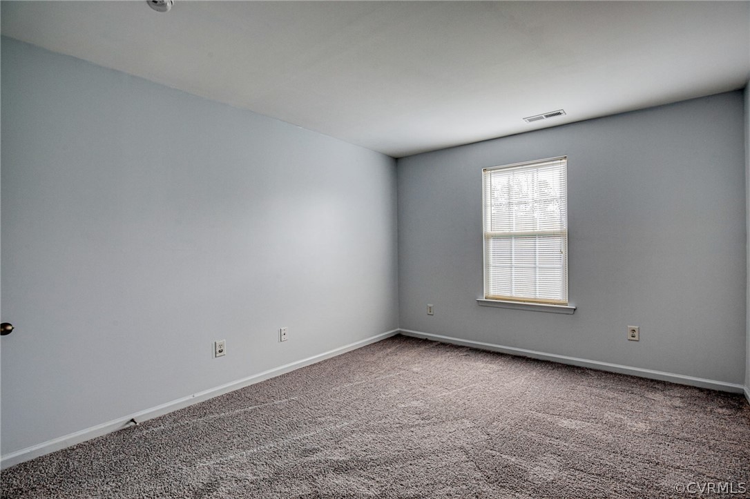 7292 Hardtack Road Mechanicsville, VA 23116 - Photo 25 of 34 an empty room with a window