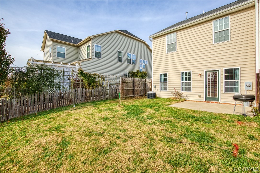 7292 Hardtack Road Mechanicsville, VA 23116 - Photo 27 of 34 a view of a house with backyard and sitting area