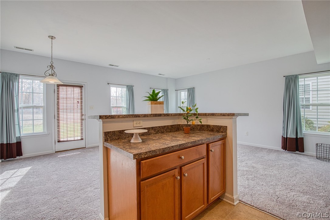 7292 Hardtack Road Mechanicsville, VA 23116 - Photo 10 of 34 a kitchen with a stove and a sink
