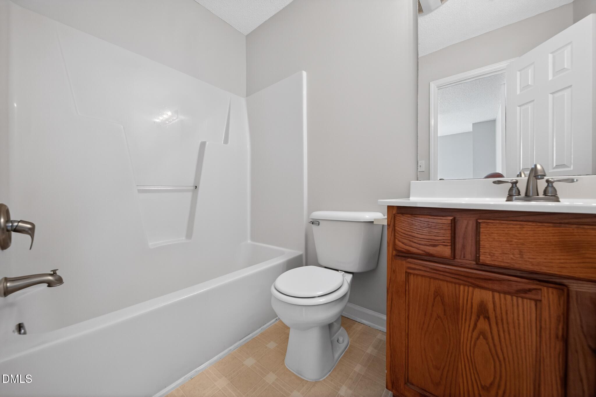 2654 Dwight Place Raleigh, NC 27610 - Photo 7 of 13 2654_Dwight_Pl-Bathroom-8064