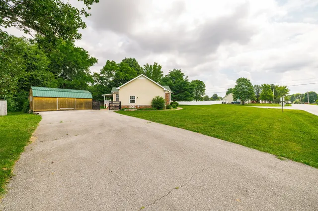 a view of backyard with green space
