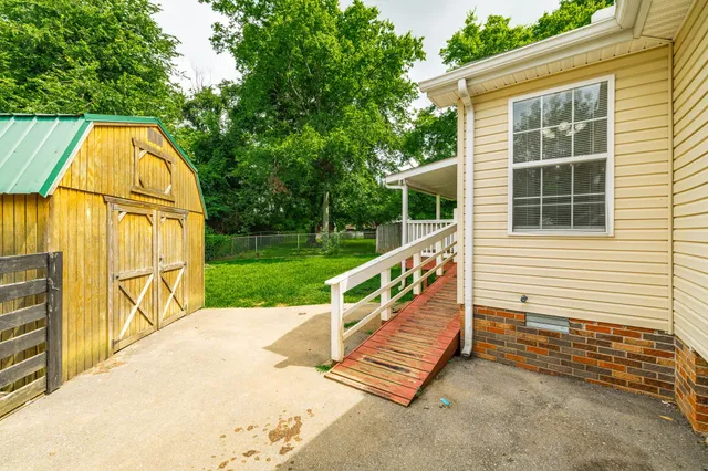 a view of swimming pool with a backyard