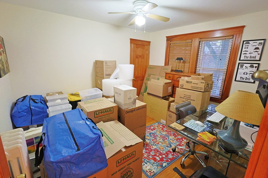 38 Ranelegh Road, Unit 1 Boston, MA 02135 - Photo 14 of 16 a living room with furniture and wooden floor