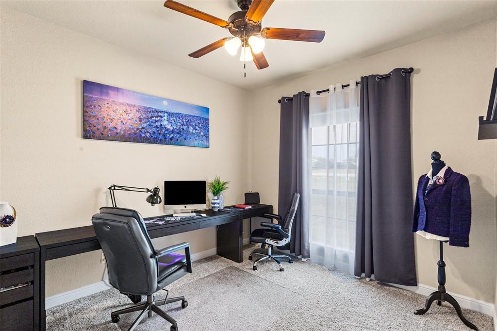 223 Cottongame Road Weatherford, TX 76088 - Photo 21 of 39 a view of a workspace with furniture and a window