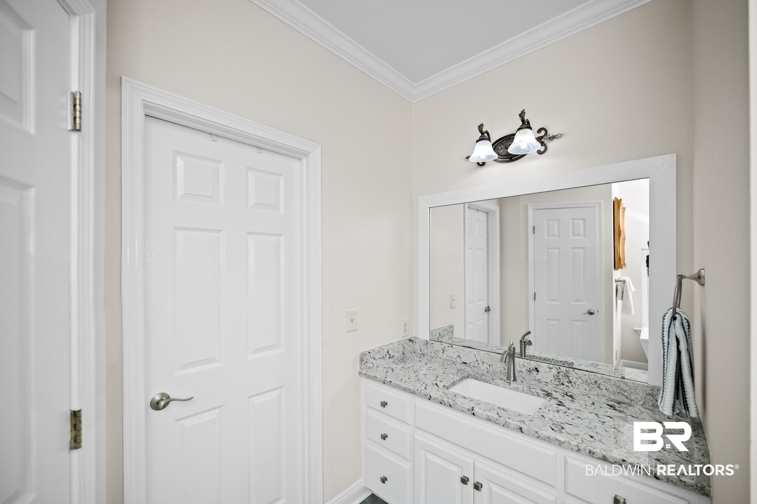 196 Morning Ridge Road Monroeville, AL 36460 - Photo 37 of 71 Bathroom featuring crown molding and vanity