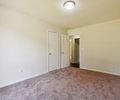 6445 Marsham Drive Atlanta, GA 30349 - Photo 18 of 28 an empty room with an entryway