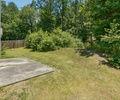6445 Marsham Drive Atlanta, GA 30349 - Photo 26 of 28 a view of a yard with a tree