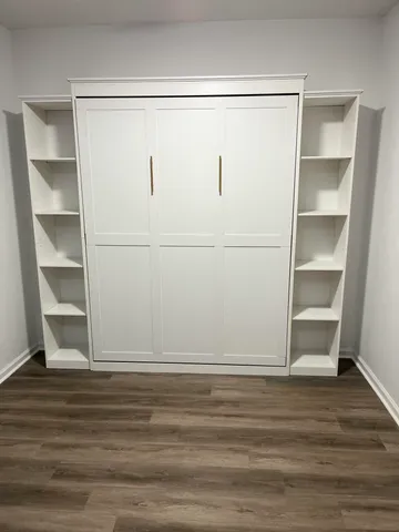 a view of an empty walk in closet