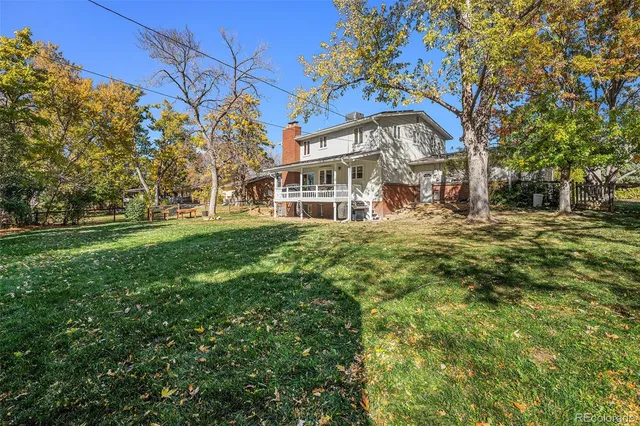 a view of yard with swimming pool