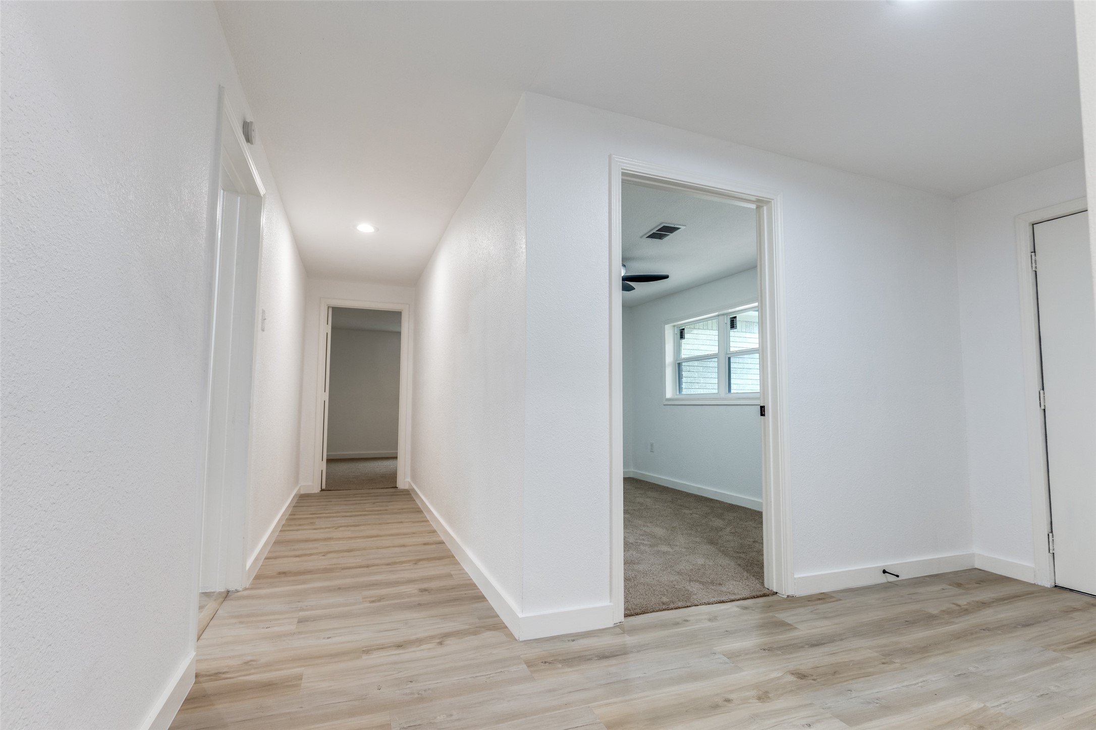2545 Jackson La Marque, TX 77568 - Photo 19 of 30 a view of a hallway with wooden floor