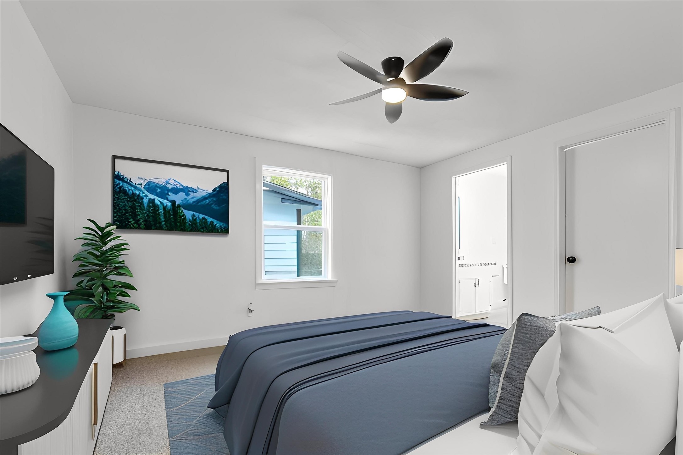 2545 Jackson La Marque, TX 77568 - Photo 23 of 30 a bedroom with a large bed and a window