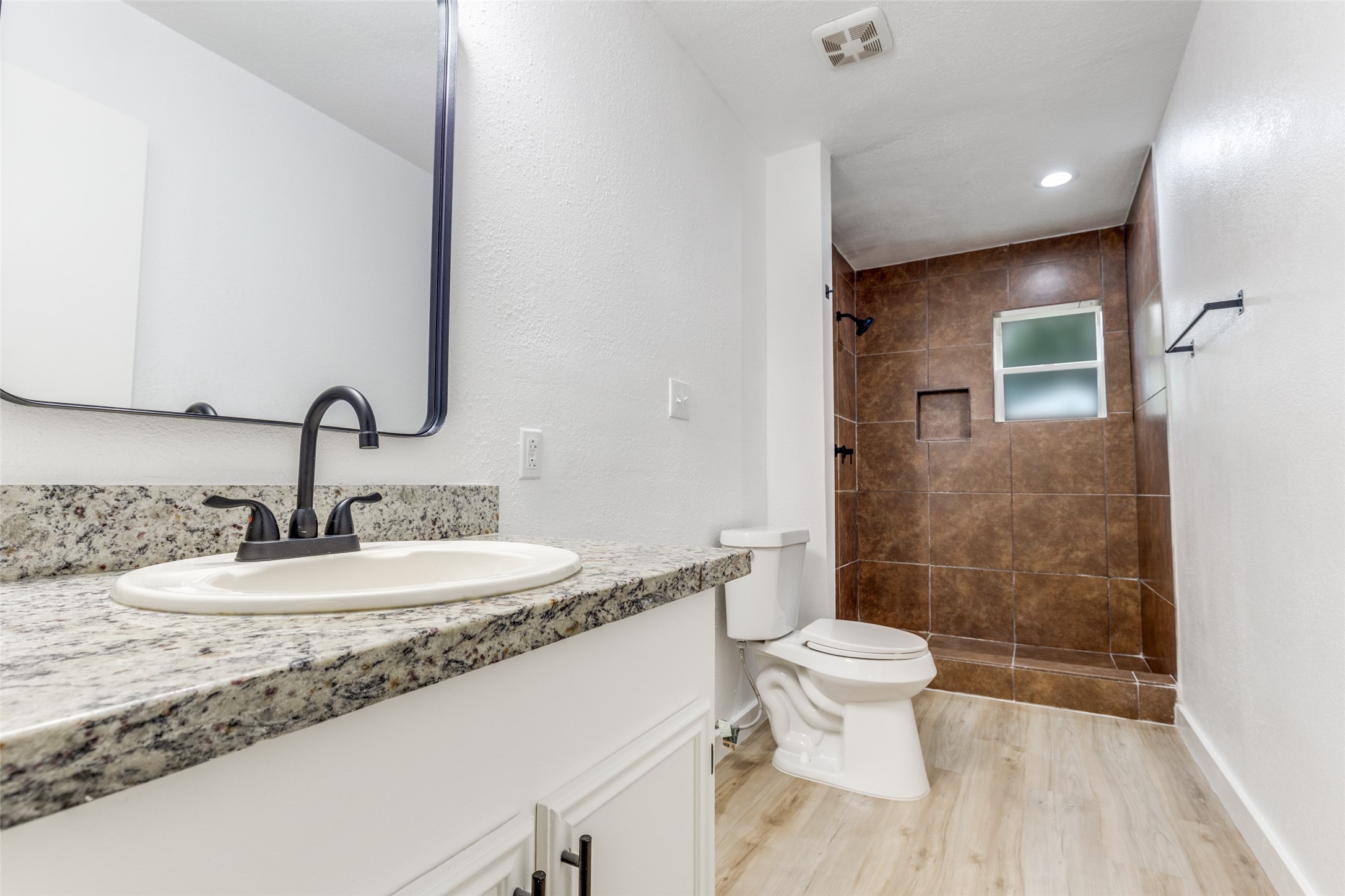 2545 Jackson La Marque, TX 77568 - Photo 26 of 30 a bathroom with a sink toilet and shower