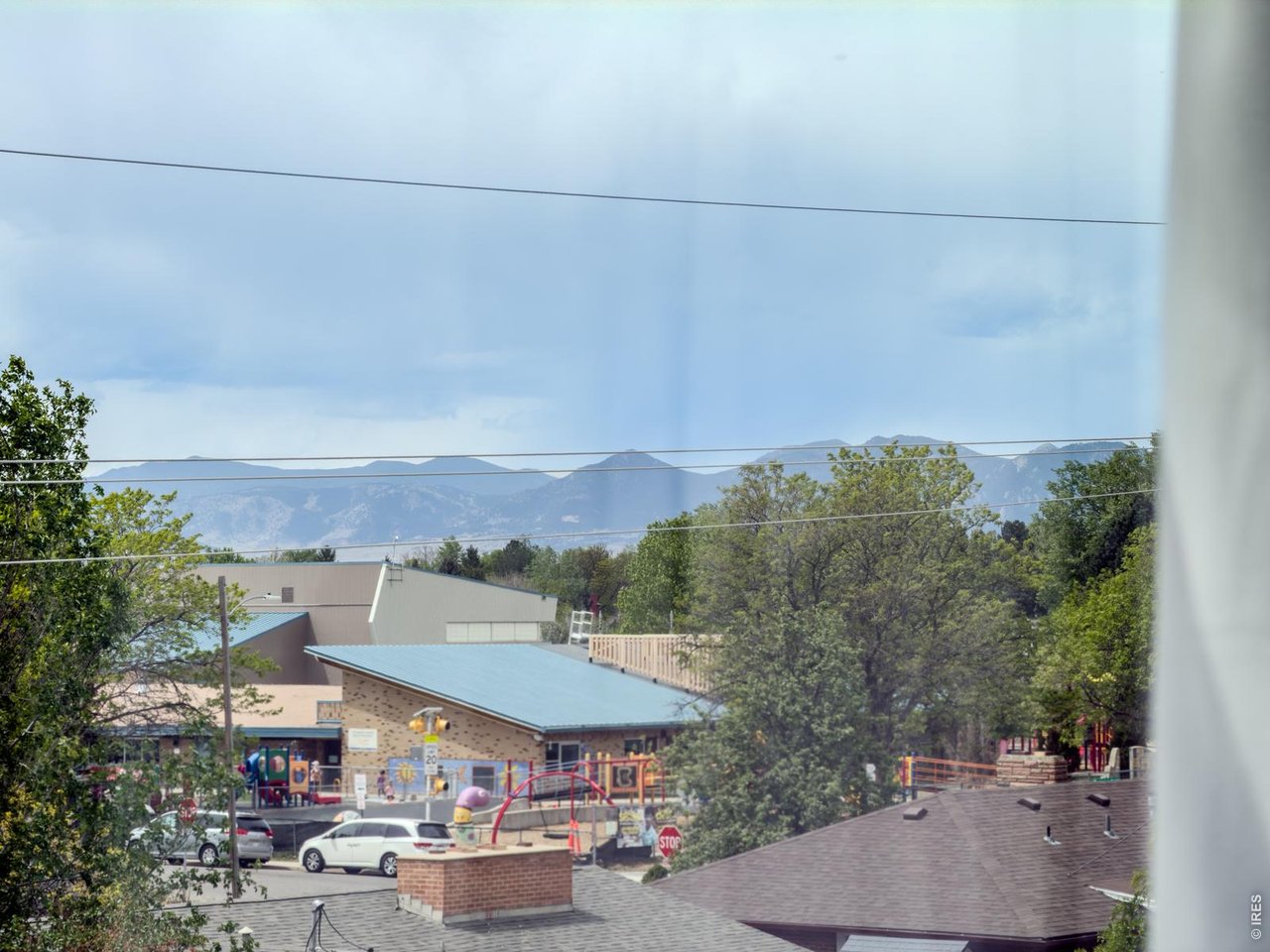 402 West Baseline Road, Unit H Lafayette, CO 80026 - Photo 23 of 45 Mountain views become a quiet, ever-present backdrop-softly extending the sense of space and retreat.