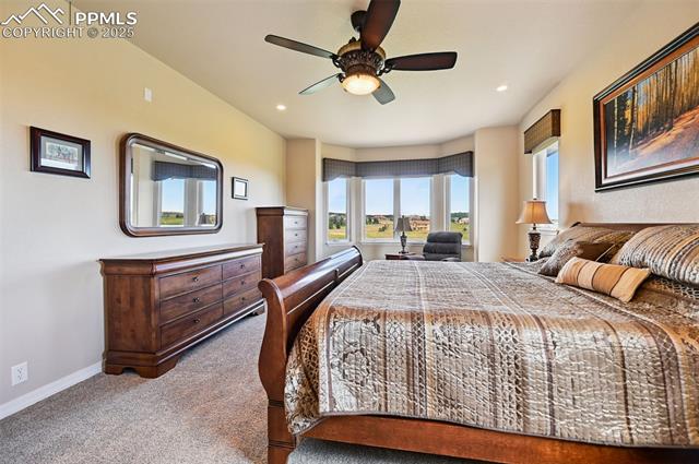 1918 Bashley Road Monument, CO 80132 - Photo 23 of 48 Carpeted bedroom with recessed lighting and a ceiling fan