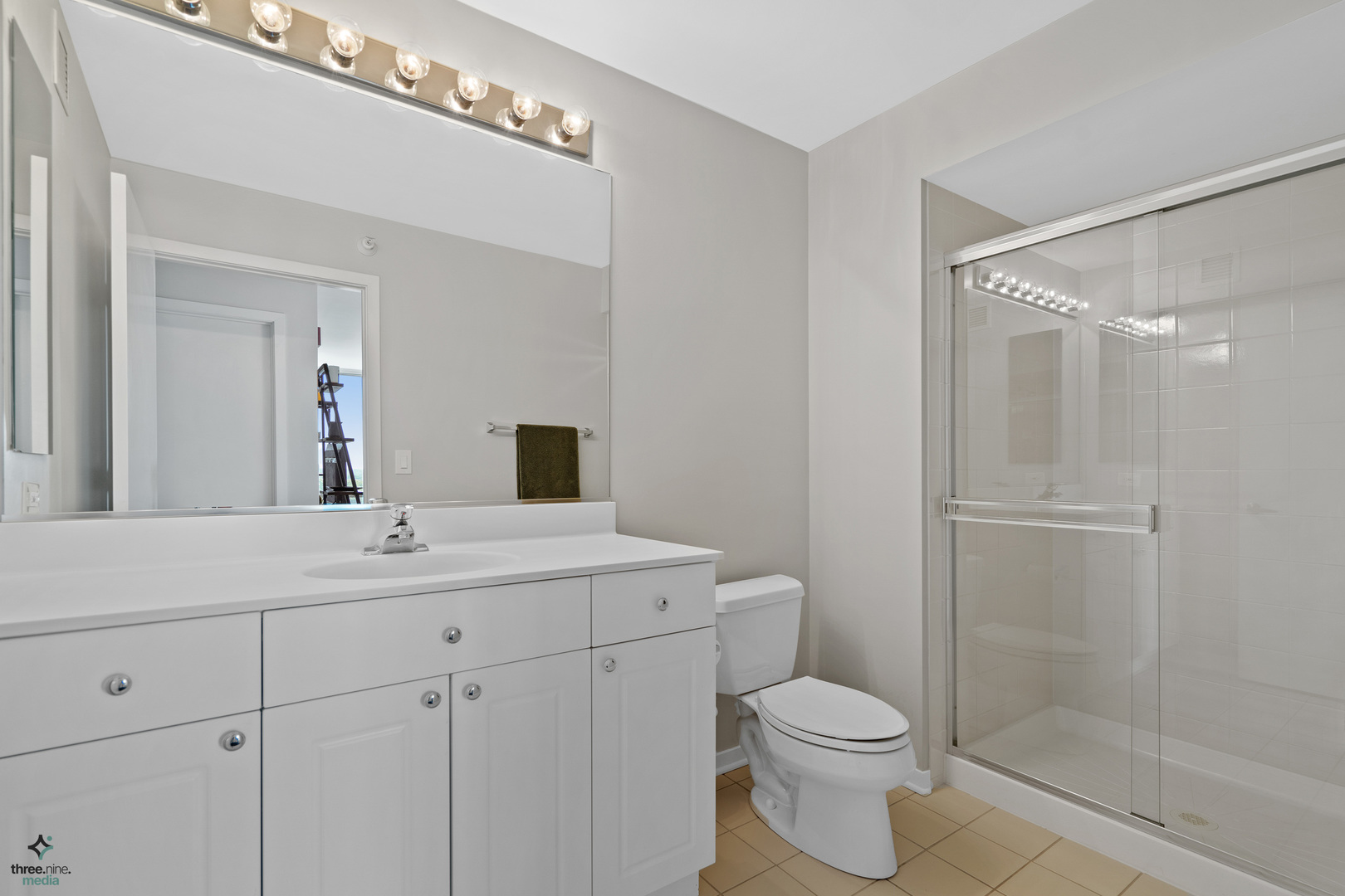1640 Maple Avenue, Unit 1205 Evanston, IL 60201 - Photo 17 of 25 a bathroom with a sink a toilet and shower