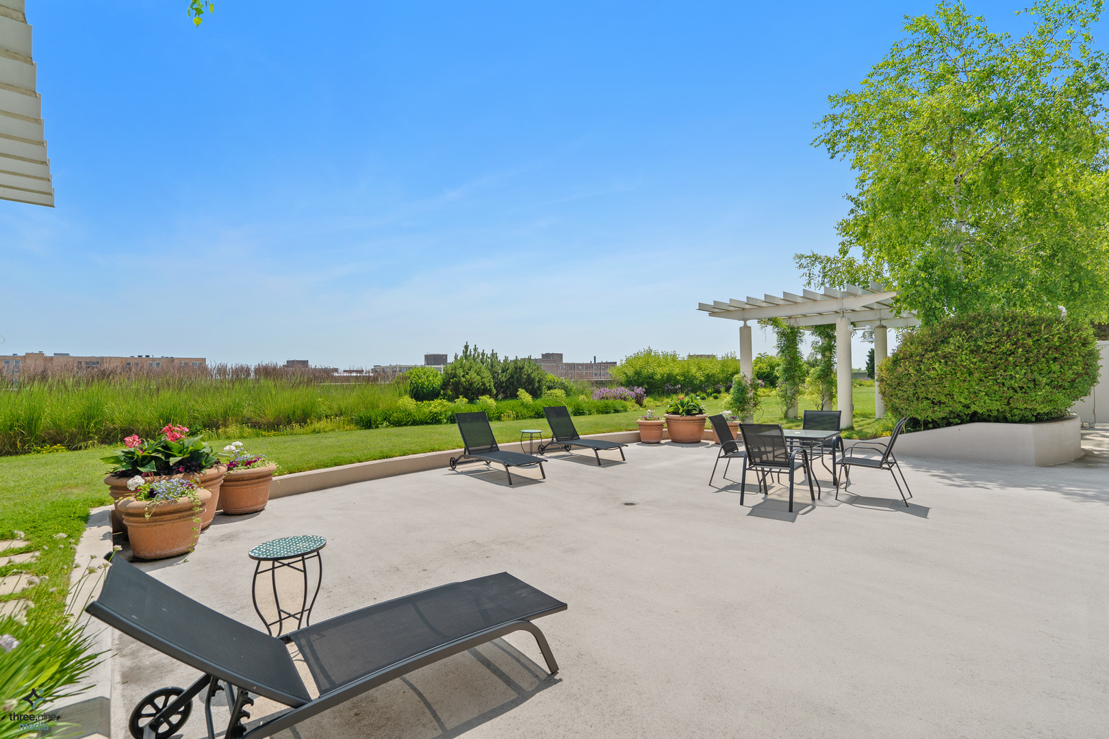 1640 Maple Avenue, Unit 1205 Evanston, IL 60201 - Photo 23 of 25 an outdoor space with furniture and garden