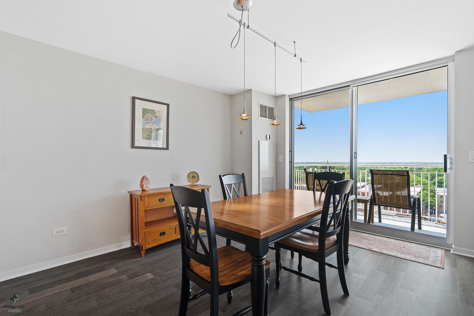 1640 Maple Avenue, Unit 1205 Evanston, IL 60201 - Photo 6 of 25 a view of a dining room with furniture window and outside view