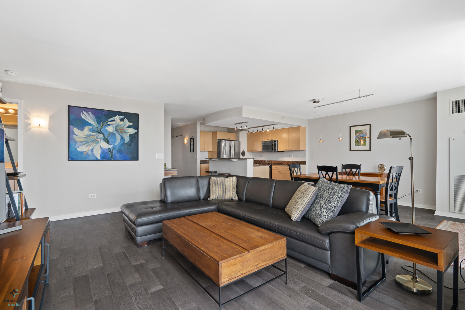 1640 Maple Avenue, Unit 1205 Evanston, IL 60201 - Photo 9 of 25 a living room with furniture a rug and a window