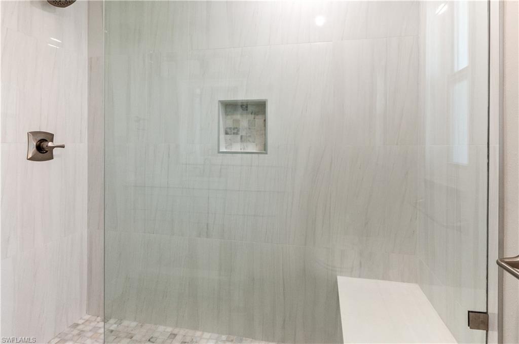54 Liberty Lane Naples, FL 34112 - Photo 17 of 30 Bathroom#2 featuring tiled shower