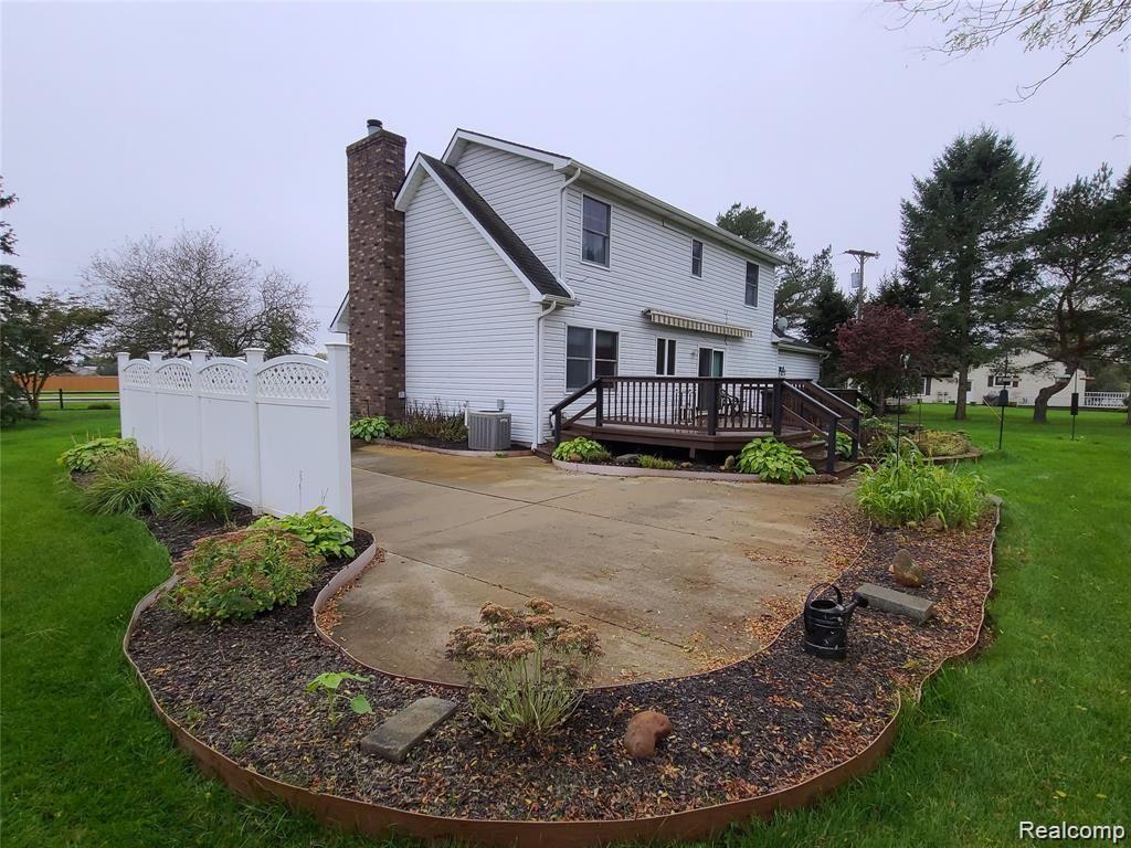3082 West Coon Lake Road Howell, MI 48843 - Photo 5 of 32 side yard 2.jpg