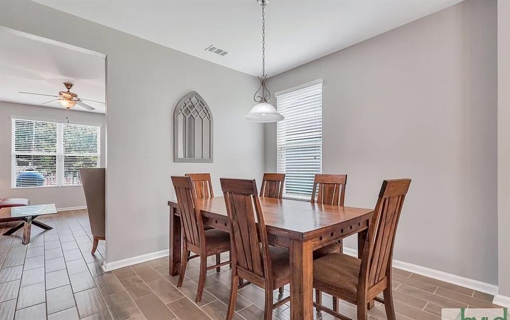 365 Southwilde Way Pooler, GA 31322 - Photo 12 of 50 a view of a dining room with furniture and window