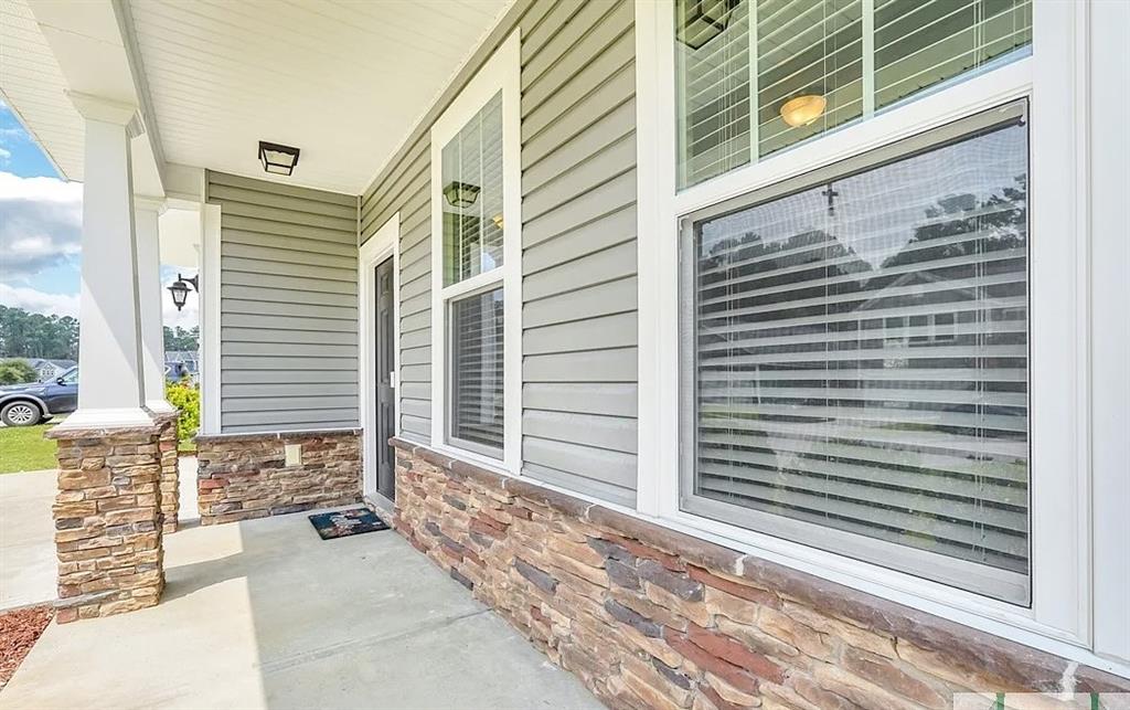 365 Southwilde Way Pooler, GA 31322 - Photo 4 of 50 a view of a porch with a bench