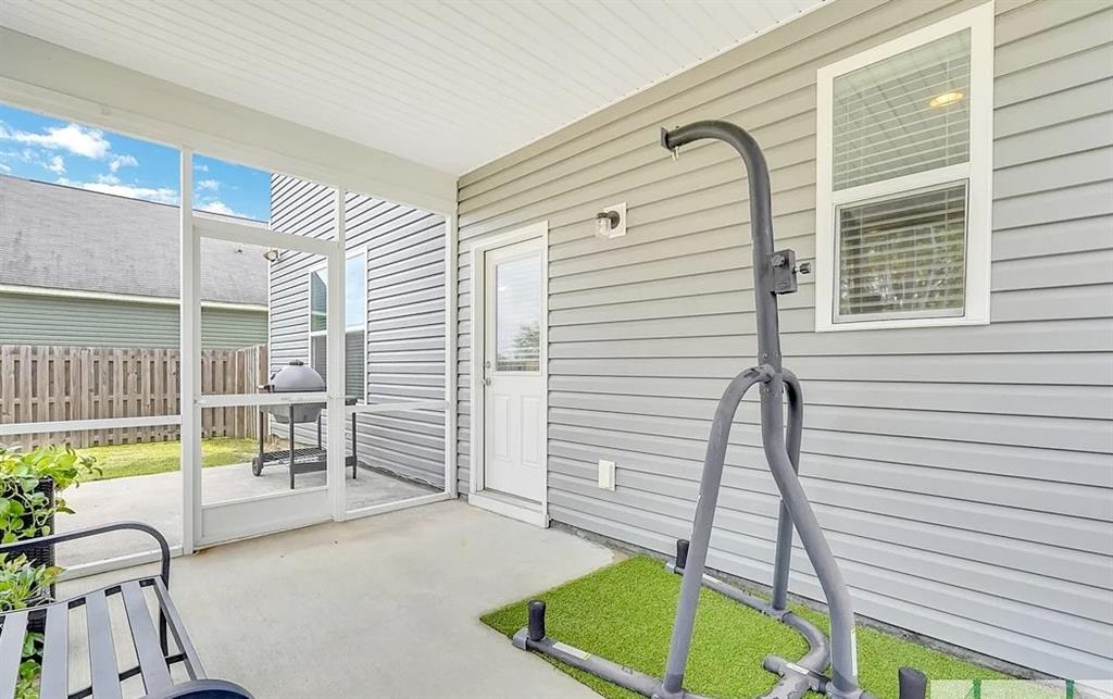 365 Southwilde Way Pooler, GA 31322 - Photo 50 of 50 a balcony with table and chairs