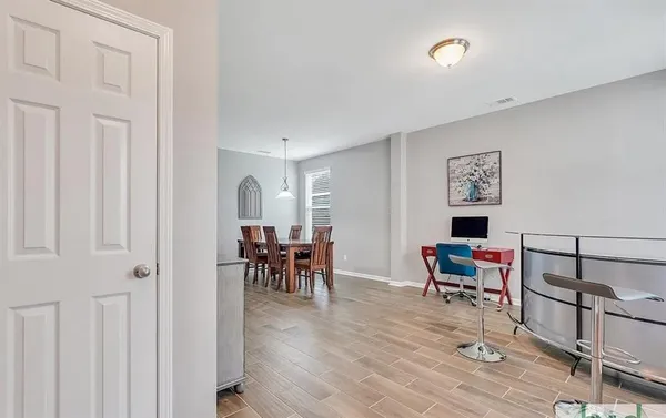 a view of a livingroom with furniture and furniture