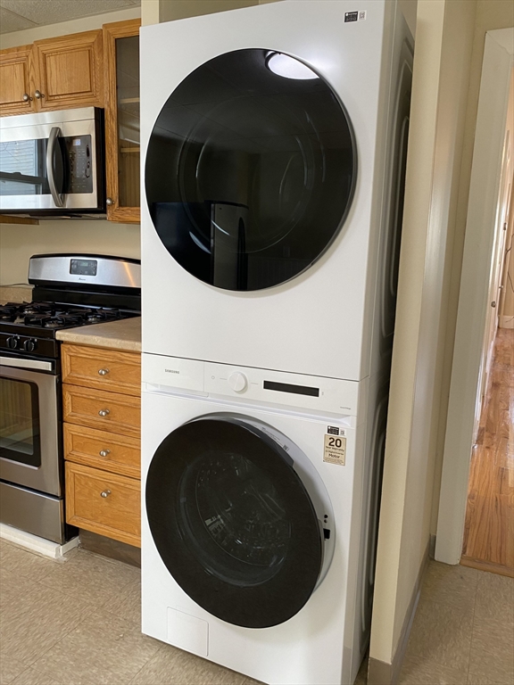 34 Porter Street, Unit 2 Malden, MA 02148 - Photo 11 of 12 a utility room with washing machine and dryer