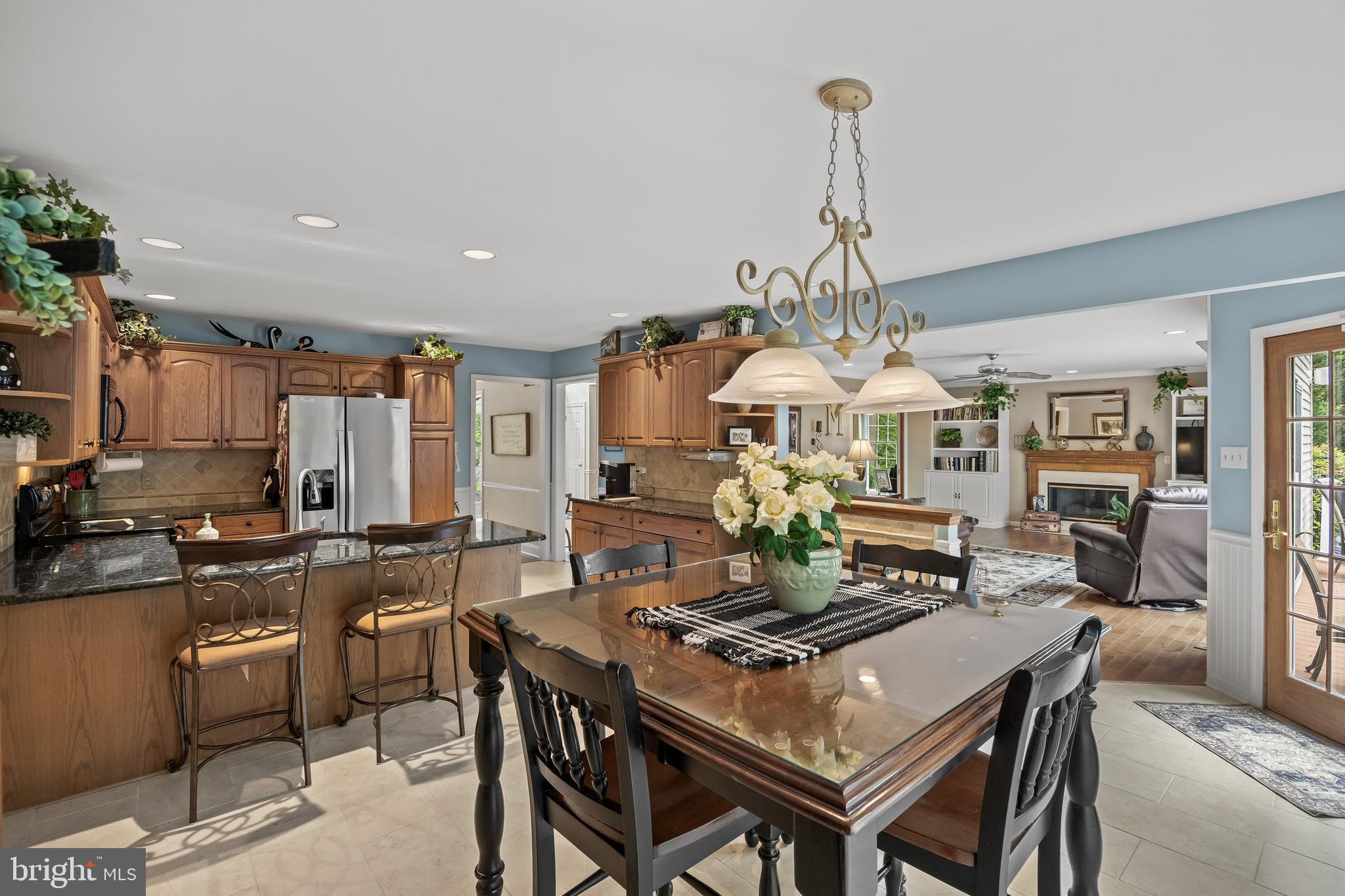 4 False Heather Way Medford, NJ 08055 - Photo 13 of 48 a view of a dining room with furniture window and wooden floor