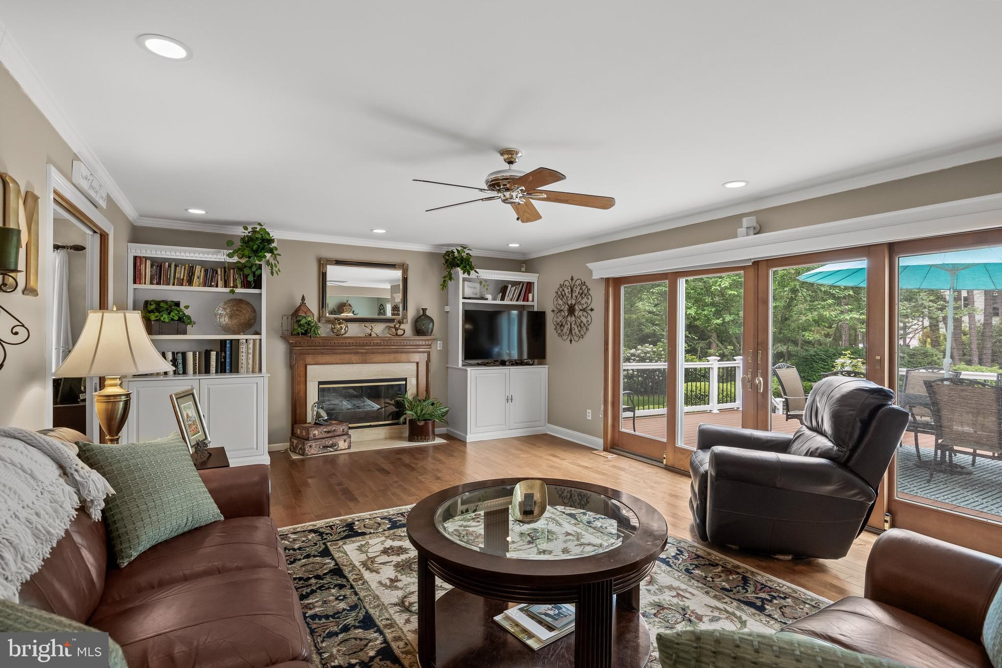 4 False Heather Way Medford, NJ 08055 - Photo 16 of 48 a living room with furniture and a fireplace