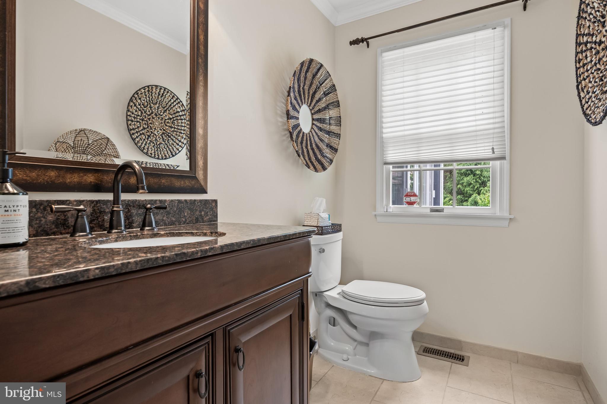 4 False Heather Way Medford, NJ 08055 - Photo 19 of 48 a bathroom with a toilet a sink and a window