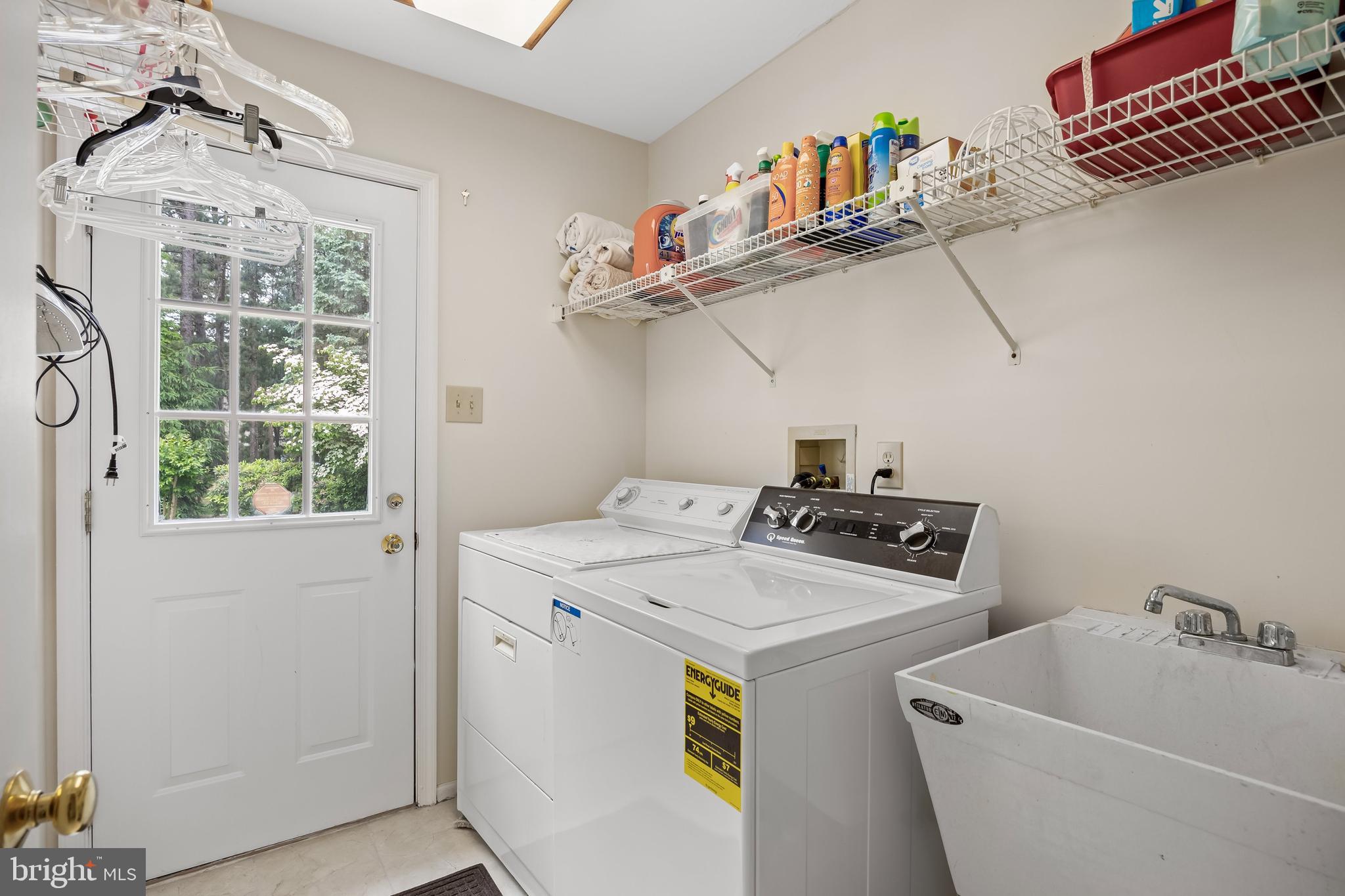 4 False Heather Way Medford, NJ 08055 - Photo 20 of 48 a utility room with dryer and washer
