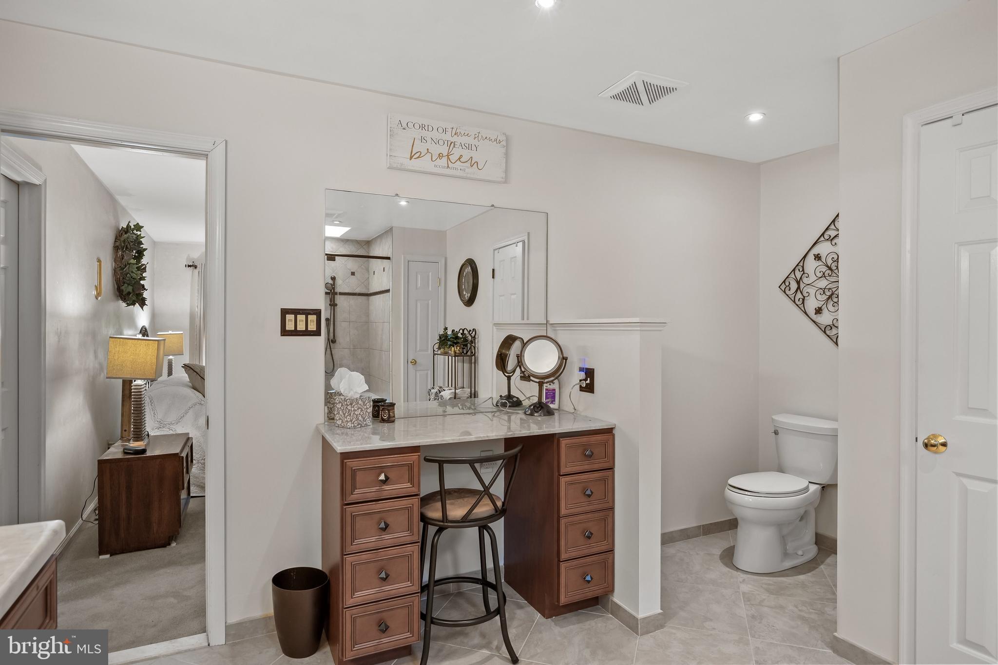 4 False Heather Way Medford, NJ 08055 - Photo 26 of 48 a view of bathroom with a toilet sink and mirror