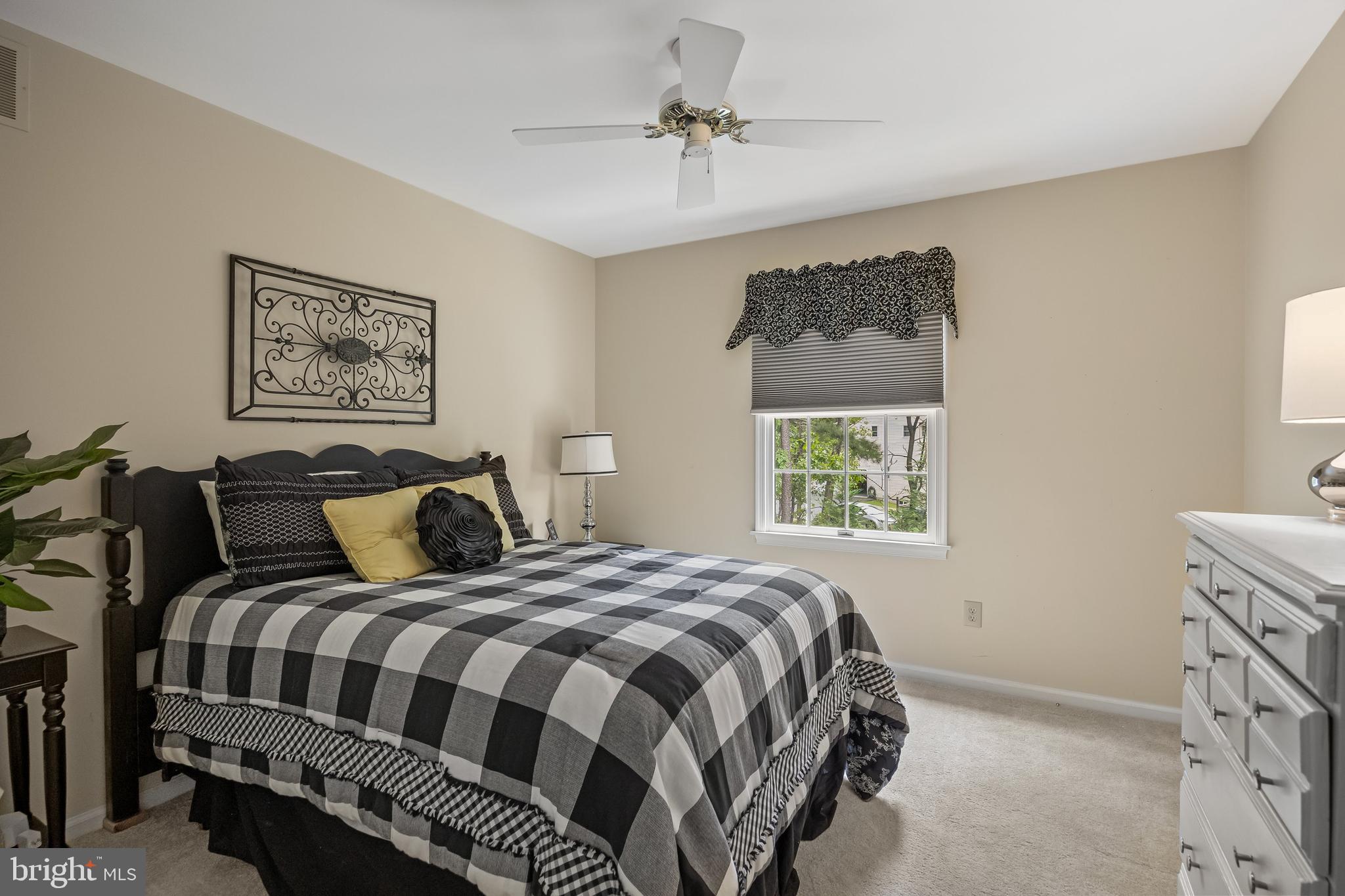 4 False Heather Way Medford, NJ 08055 - Photo 28 of 48 a bedroom with a bed and a window