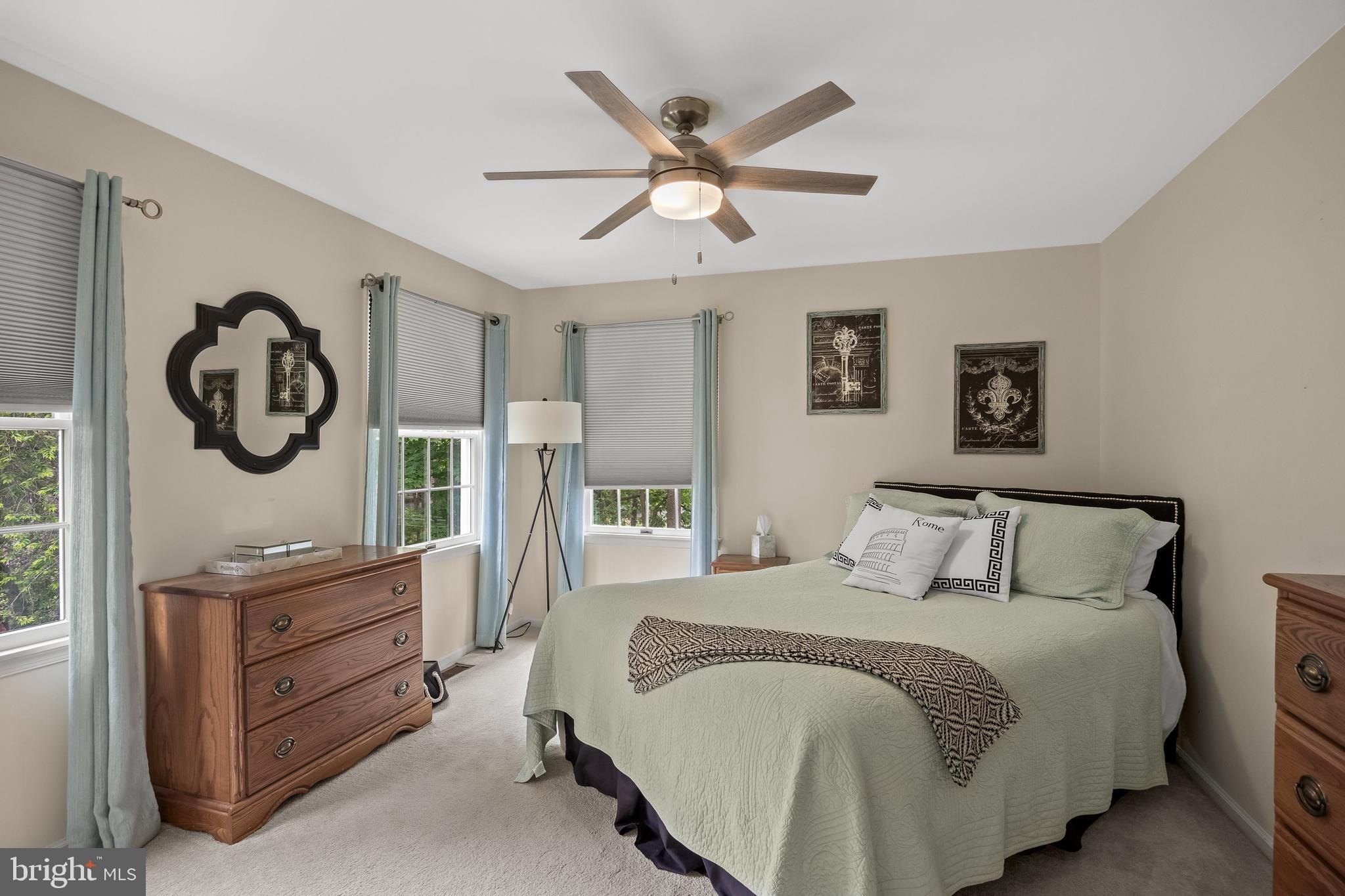 4 False Heather Way Medford, NJ 08055 - Photo 29 of 48 a bedroom with a bed and a large window