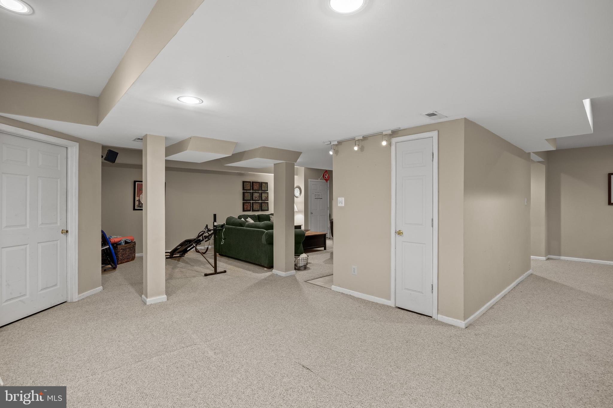 4 False Heather Way Medford, NJ 08055 - Photo 33 of 48 an empty room with furniture and a refrigerator