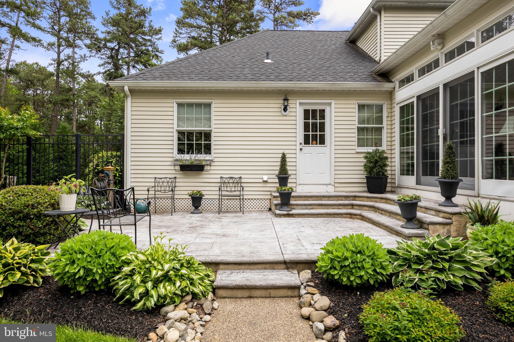 4 False Heather Way Medford, NJ 08055 - Photo 35 of 48 a view of a house with backyard and sitting area